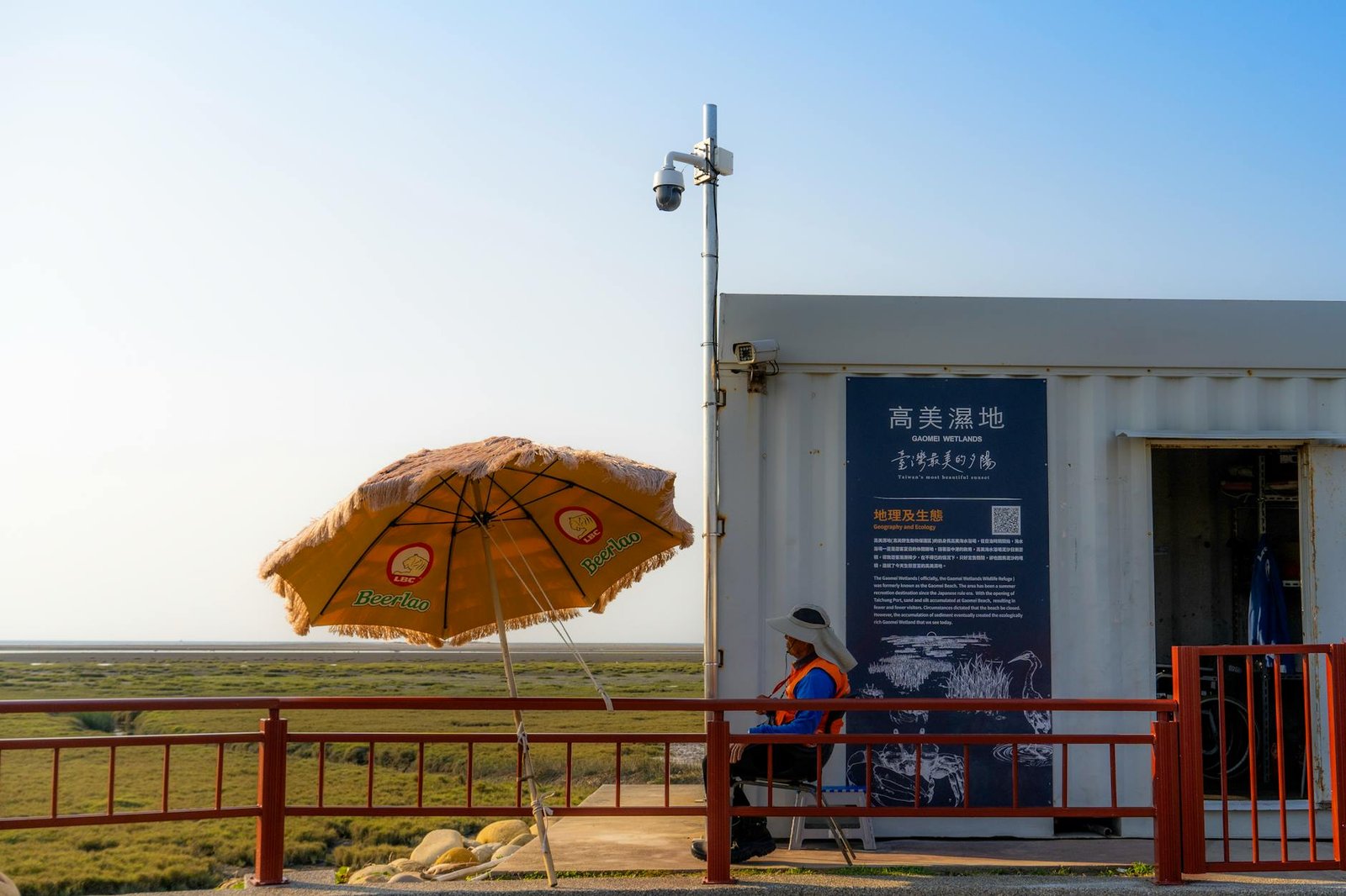Observer at Gao Mei Wetland, contemplating finances as an autonomous worker in Taiwan.